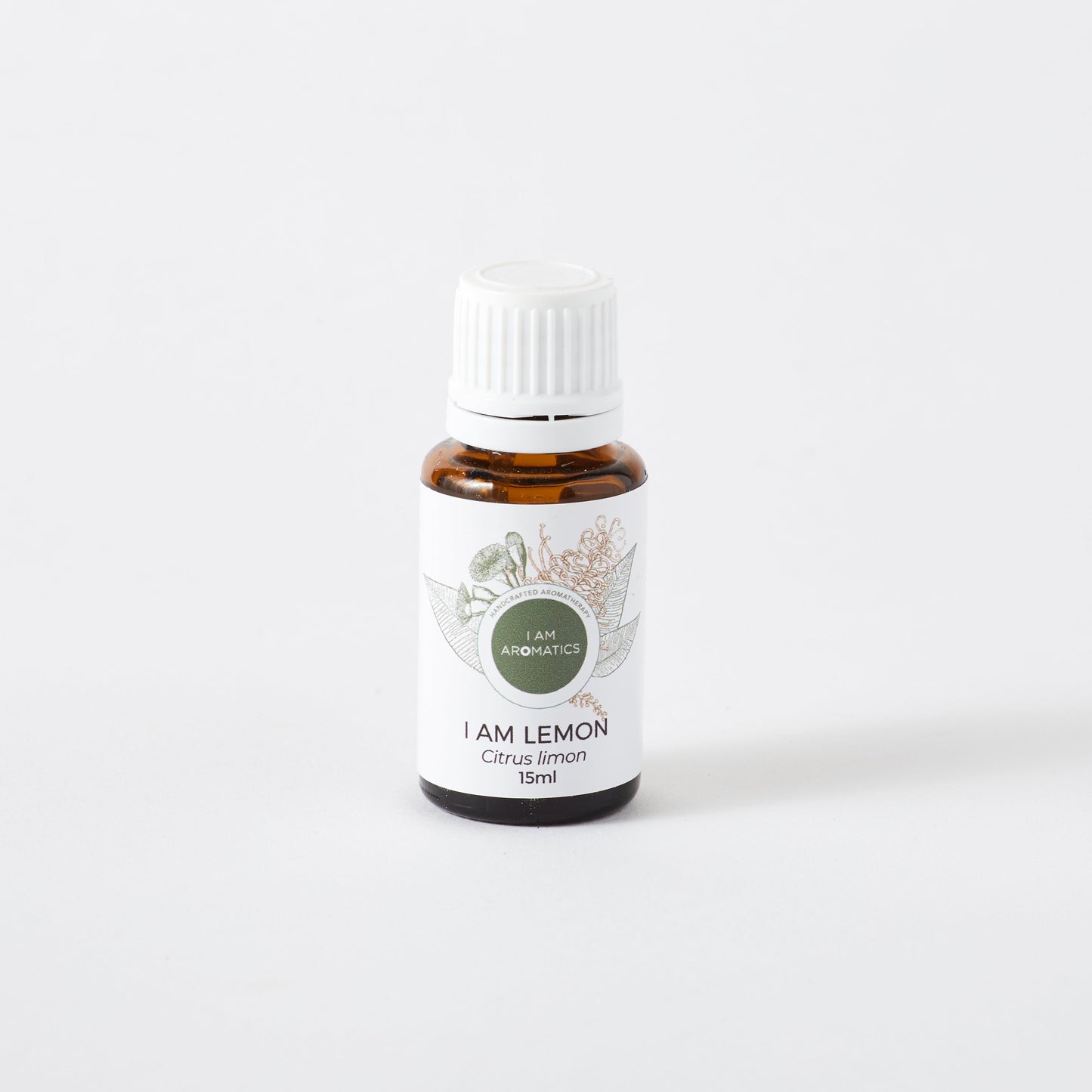 lemon essential oil 15ml amber bottle with botanical logo